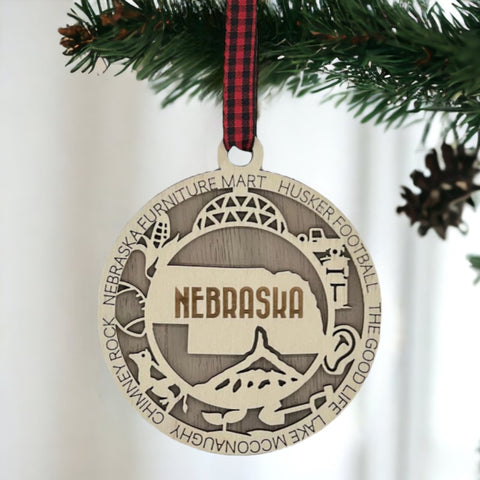 Deck your tree with a dash of Cornhusker pride! Our Nebraska State Highlights Ornament celebrates iconic moments in the heart of the Midwest.