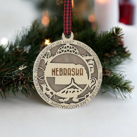 Deck your tree with a dash of Cornhusker pride! Our Nebraska State Highlights Ornament celebrates iconic moments in the heart of the Midwest.