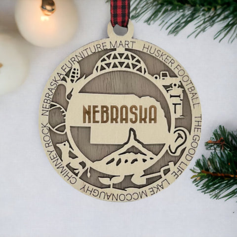 Deck your tree with a dash of Cornhusker pride! Our Nebraska State Highlights Ornament celebrates iconic moments in the heart of the Midwest.