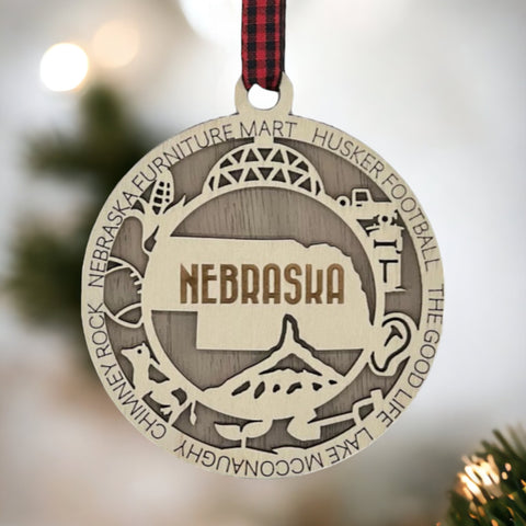 Deck your tree with a dash of Cornhusker pride! Our Nebraska State Highlights Ornament celebrates iconic moments in the heart of the Midwest.