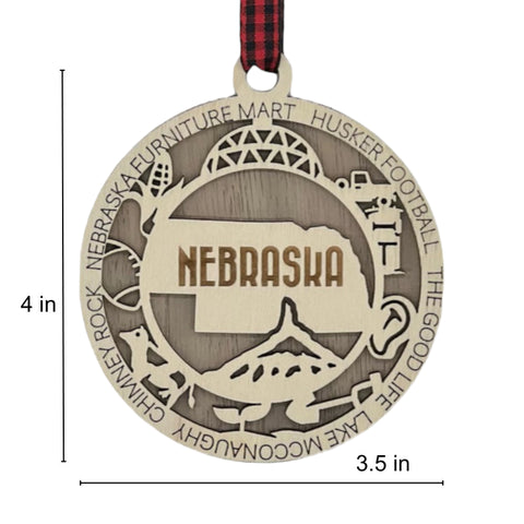 Deck your tree with a dash of Cornhusker pride! Our Nebraska State Highlights Ornament celebrates iconic moments in the heart of the Midwest.
