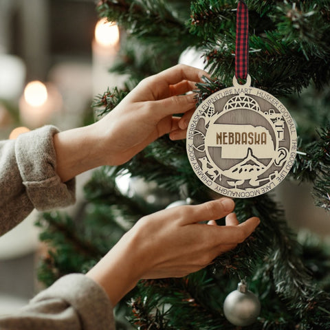 Deck your tree with a dash of Cornhusker pride! Our Nebraska State Highlights Ornament celebrates iconic moments in the heart of the Midwest.