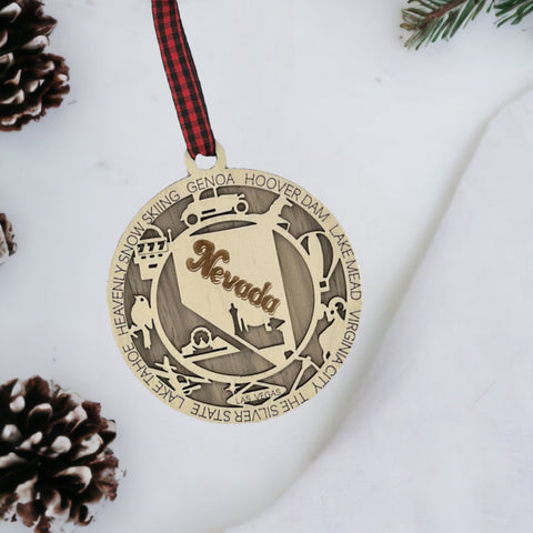 Add a touch of Silver State sparkle to your holiday decor! Our Nevada State Highlights Ornament captures the glitz and glam of iconic moments.
