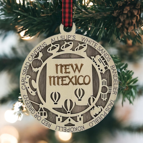 Unwrap the spirit of the Land of Enchantment! Introducing the New Mexico State Highlights Ornament – a touch of southwestern magic for your holiday decor. Elevate your festivities with the vibrant colors and culture of the Land of Enchantment!
