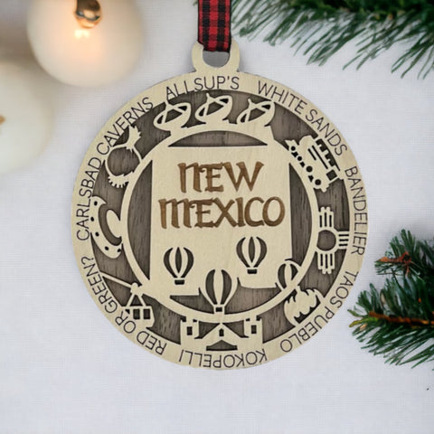 Unwrap the spirit of the Land of Enchantment! Introducing the New Mexico State Highlights Ornament – a touch of southwestern magic for your holiday decor. Elevate your festivities with the vibrant colors and culture of the Land of Enchantment!