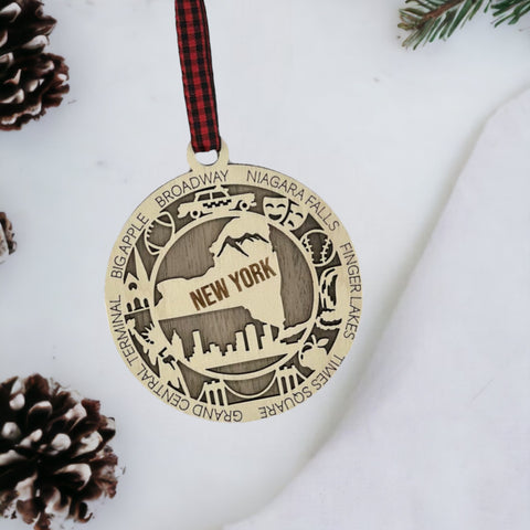 Capture the Empire State's magic with our New York State Highlights Ornament! A miniature masterpiece featuring iconic landmarks and vibrant scenes. Elevate your holiday décor with a touch of New York charm.