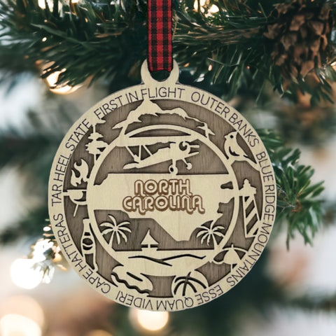 Dazzle your tree with Southern charm! Introducing the North Carolina State Highlights Ornament – a delightful keepsake showcasing the beauty of the Tar Heel State.