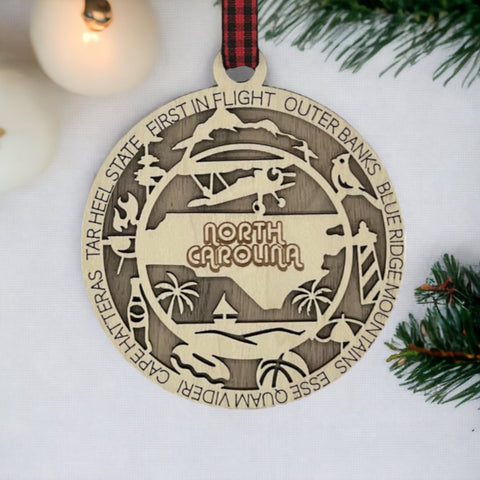 Dazzle your tree with Southern charm! Introducing the North Carolina State Highlights Ornament – a delightful keepsake showcasing the beauty of the Tar Heel State.