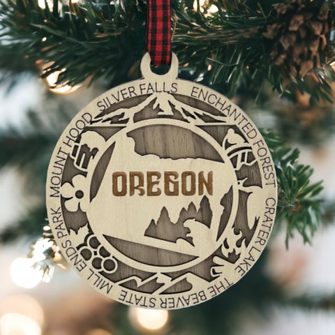 Oregon dreams on your tree! Introducing the Oregon State Highlights Ornament—a mini masterpiece capturing the beauty of the Pacific Northwest. Elevate your holiday decor with a touch of Oregonian magic. Embrace the spirit of the Beaver State this festive season!