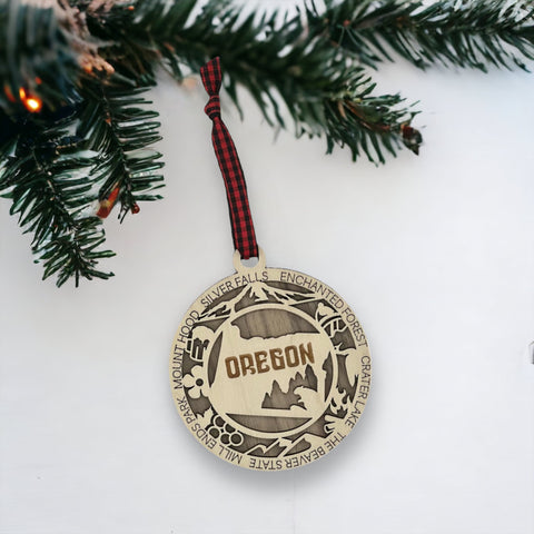 Oregon dreams on your tree! Introducing the Oregon State Highlights Ornament—a mini masterpiece capturing the beauty of the Pacific Northwest. Elevate your holiday decor with a touch of Oregonian magic. Embrace the spirit of the Beaver State this festive season!