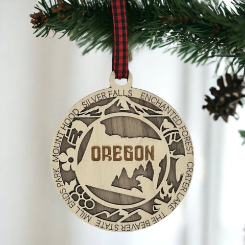 Oregon dreams on your tree! Introducing the Oregon State Highlights Ornament—a mini masterpiece capturing the beauty of the Pacific Northwest. Elevate your holiday decor with a touch of Oregonian magic. Embrace the spirit of the Beaver State this festive season!