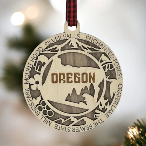 Oregon dreams on your tree! Introducing the Oregon State Highlights Ornament—a mini masterpiece capturing the beauty of the Pacific Northwest. Elevate your holiday decor with a touch of Oregonian magic. Embrace the spirit of the Beaver State this festive season!