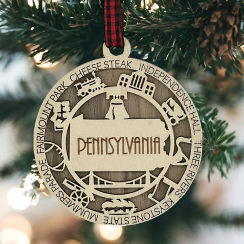Keystone State charisma for your tree! Introducing the Pennsylvania State Highlights Ornament—a miniature masterpiece celebrating history and hometown pride. Elevate your holiday decor with a touch of Pennsylvania charm.
