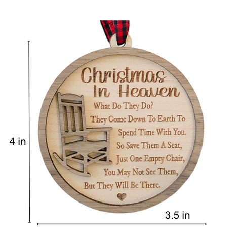 Officially licensed Christmas in Heaven memorial wooden ornament by John F Connor, featuring a poignant chair design with the iconic 'Christmas in Heaven' poem. A heartfelt remembrance gift for the holiday season, this maple and walnut ornament can be personalized on the back with any name or phrase. Versatile for use as a tree ornament or a year-round display, it serves as a touching sympathy gift, preserving cherished memories with enduring grace.