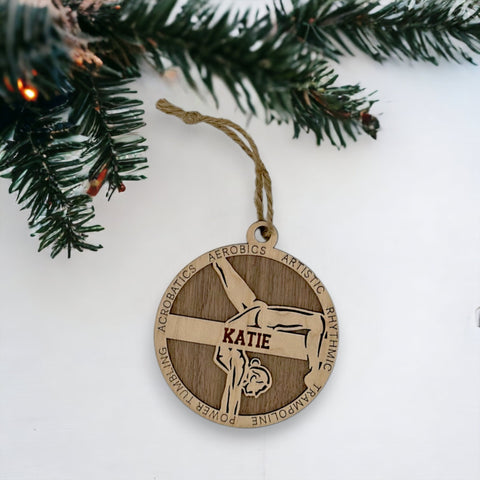 Sparkle and flip into the holiday season with our Personalized Female Gymnast Ornament! Crafted for gymnastics enthusiasts, this custom keepsake adds a personal touch to your tree. Celebrate the grace and strength of your gymnast with this spirited ornament. Customize now for a dazzling touch in holiday decor – order your Personalized Female Gymnast Ornament today!