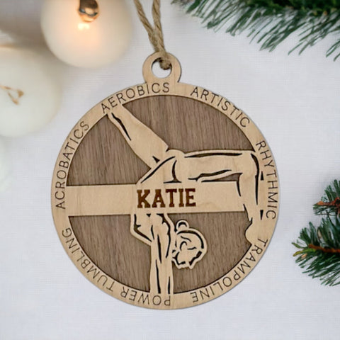 Sparkle and flip into the holiday season with our Personalized Female Gymnast Ornament! Crafted for gymnastics enthusiasts, this custom keepsake adds a personal touch to your tree. Celebrate the grace and strength of your gymnast with this spirited ornament. Customize now for a dazzling touch in holiday decor – order your Personalized Female Gymnast Ornament today!