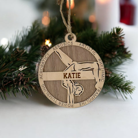 Sparkle and flip into the holiday season with our Personalized Female Gymnast Ornament! Crafted for gymnastics enthusiasts, this custom keepsake adds a personal touch to your tree. Celebrate the grace and strength of your gymnast with this spirited ornament. Customize now for a dazzling touch in holiday decor – order your Personalized Female Gymnast Ornament today!