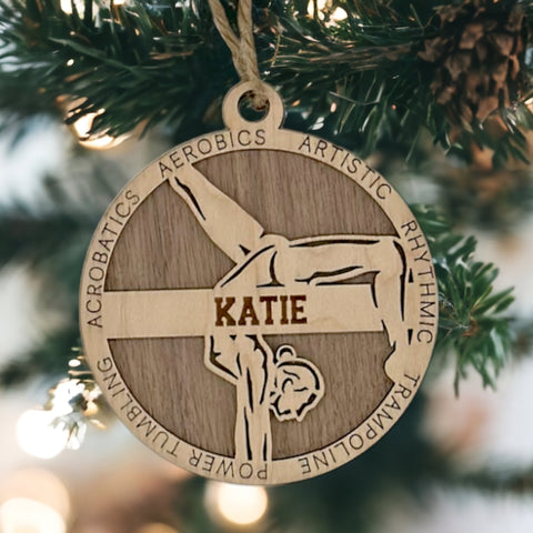 Sparkle and flip into the holiday season with our Personalized Female Gymnast Ornament! Crafted for gymnastics enthusiasts, this custom keepsake adds a personal touch to your tree. Celebrate the grace and strength of your gymnast with this spirited ornament. Customize now for a dazzling touch in holiday decor – order your Personalized Female Gymnast Ornament today!