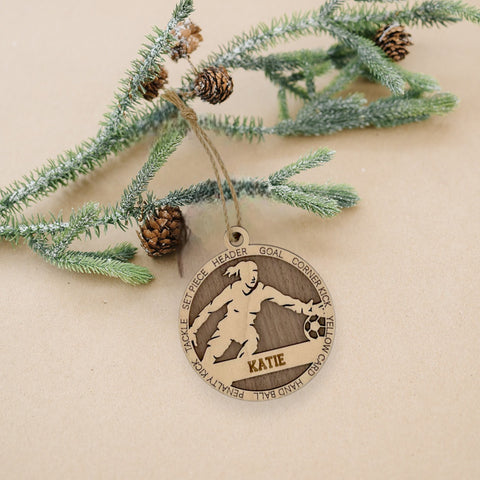 Defend your holiday spirit with our Personalized Female Soccer Goalie Ornament! Crafted for soccer enthusiasts, this custom keepsake adds a personal touch to your tree. Celebrate the goalie in your life with this spirited ornament. Customize now for a winning goal in holiday decor – order your Personalized Female Soccer Goalie Ornament today!