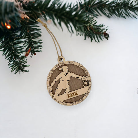 Defend your holiday spirit with our Personalized Female Soccer Goalie Ornament! Crafted for soccer enthusiasts, this custom keepsake adds a personal touch to your tree. Celebrate the goalie in your life with this spirited ornament. Customize now for a winning goal in holiday decor – order your Personalized Female Soccer Goalie Ornament today!