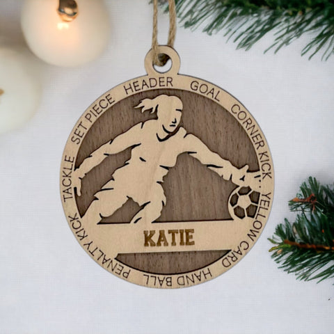Defend your holiday spirit with our Personalized Female Soccer Goalie Ornament! Crafted for soccer enthusiasts, this custom keepsake adds a personal touch to your tree. Celebrate the goalie in your life with this spirited ornament. Customize now for a winning goal in holiday decor – order your Personalized Female Soccer Goalie Ornament today!