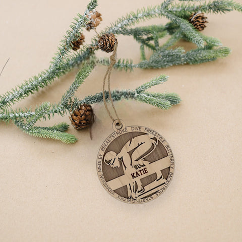 Make a splash in holiday celebrations with our Personalized Female Swimmer Ornament! Designed for aquatic enthusiasts, this custom keepsake adds a personal touch to your tree. Celebrate the swimmer in your life with this spirited ornament. Customize now for a wave of festivity in holiday decor – order your Personalized Female Swimmer Ornament today!