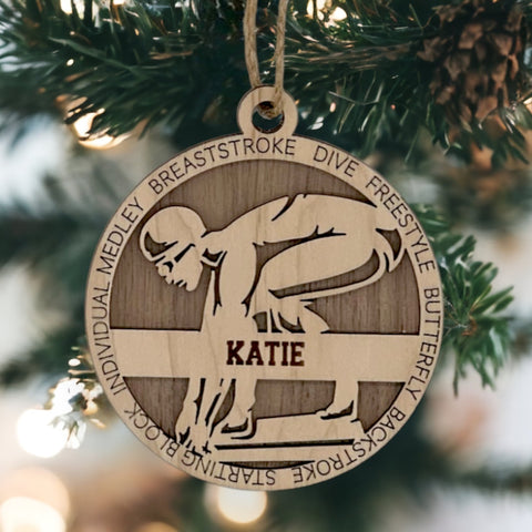 Make a splash in holiday celebrations with our Personalized Female Swimmer Ornament! Designed for aquatic enthusiasts, this custom keepsake adds a personal touch to your tree. Celebrate the swimmer in your life with this spirited ornament. Customize now for a wave of festivity in holiday decor – order your Personalized Female Swimmer Ornament today!