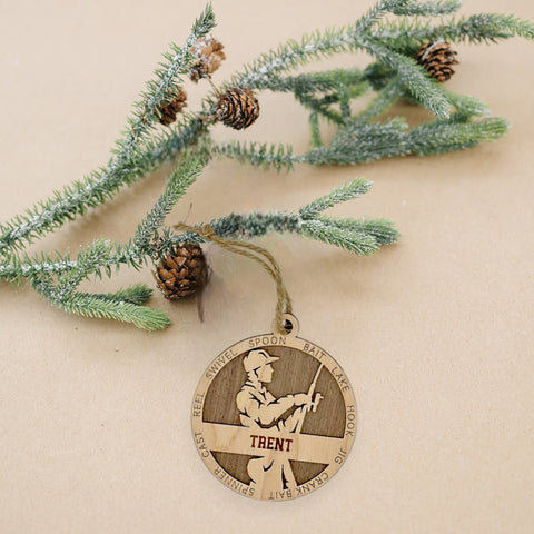 Reel in the holiday joy with our Personalized Male Fishing Ornament! Crafted for fishing enthusiasts, this custom keepsake adds a personal touch to your tree. Celebrate the catch and passion of your angler with this spirited ornament. Customize now for a reel-y unique touch in holiday decor – order your Personalized Male Fishing Ornament today!