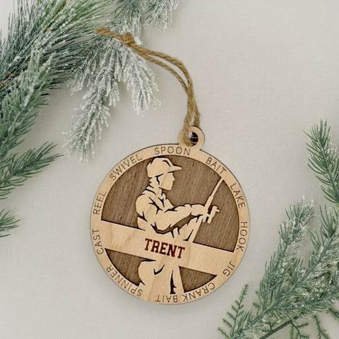 Reel in the holiday joy with our Personalized Male Fishing Ornament! Crafted for fishing enthusiasts, this custom keepsake adds a personal touch to your tree. Celebrate the catch and passion of your angler with this spirited ornament. Customize now for a reel-y unique touch in holiday decor – order your Personalized Male Fishing Ornament today!