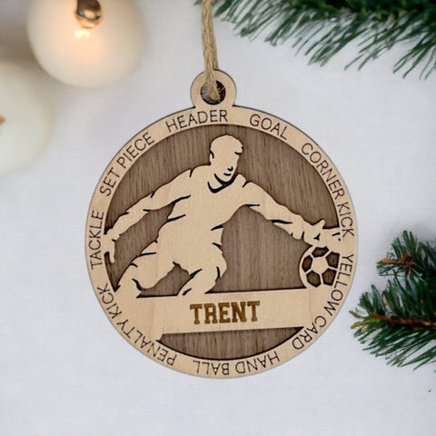 Guard your holiday spirit with our Personalized Male Soccer Goalie Ornament! Score big with this custom-crafted keepsake designed for soccer enthusiasts. Add a personal touch to your tree and celebrate the goalie in your life. Customize now for a spirited ornament that captures the excitement of the game. Make your holiday decor a winning goal – order your Personalized Male Soccer Goalie Ornament today!