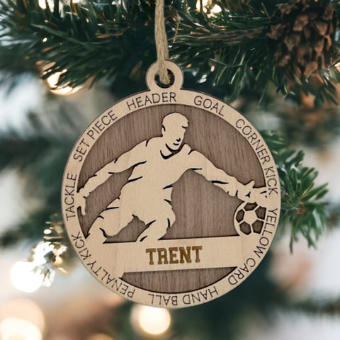 Guard your holiday spirit with our Personalized Male Soccer Goalie Ornament! Score big with this custom-crafted keepsake designed for soccer enthusiasts. Add a personal touch to your tree and celebrate the goalie in your life. Customize now for a spirited ornament that captures the excitement of the game. Make your holiday decor a winning goal – order your Personalized Male Soccer Goalie Ornament today!