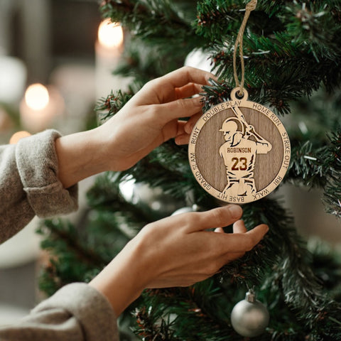 Hit a home run for the holidays with our Personalized Softball Ornament! Crafted for softball enthusiasts, this custom keepsake adds a personal touch to your tree. Celebrate the swing and spirit of your player with this spirited ornament. Customize now for a winning touch in holiday decor – order your Personalized Softball Ornament today!