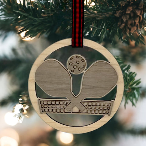 Personalized Pickleball Paddle Ornament, a sporty and unique addition to your holiday decor. Customize with a name or special message, celebrating the joy of pickleball and creating a cherished keepsake for enthusiasts during the festive season.