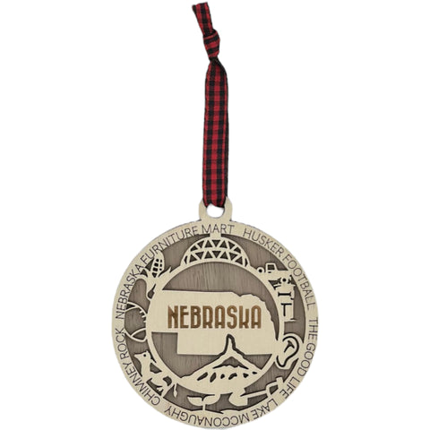 Deck your tree with a dash of Cornhusker pride! Our Nebraska State Highlights Ornament celebrates iconic moments in the heart of the Midwest.