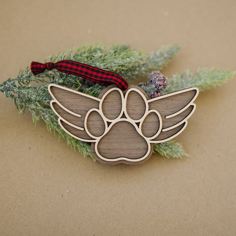 Gentle tribute with the Dog Paw Personalized Memorial Ornament - A loving remembrance for your cherished canine friend. Personalize with your dog's name, creating a special ornament to honor their memory during the holiday season.