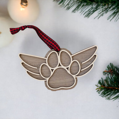 Gentle tribute with the Dog Paw Personalized Memorial Ornament - A loving remembrance for your cherished canine friend. Personalize with your dog's name, creating a special ornament to honor their memory during the holiday season.
