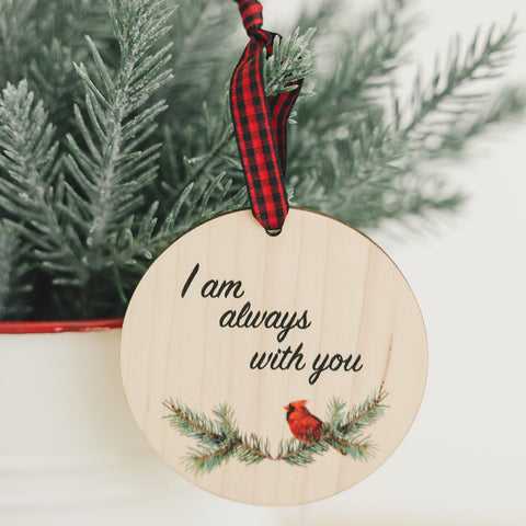 Beautiful red cardinal memorial ornament, symbolizing a loved one's presence. A poignant tribute adorned with a red bird, capturing the spirit and memory of a cherished individual, bringing comfort and warmth during the holiday season.