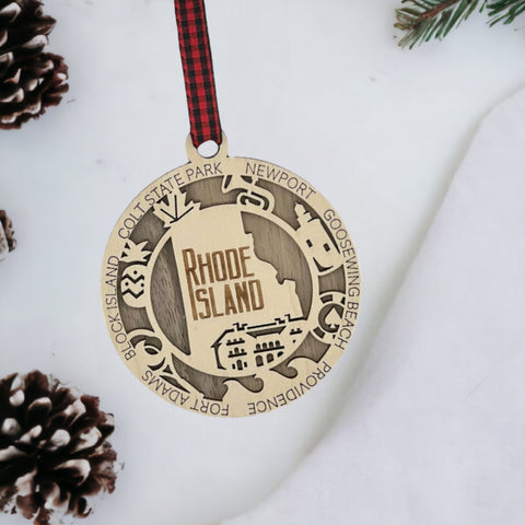 Tiny state, big charm! Introducing the Rhode Island Highlights Ornament—a delightful tribute to the Ocean State's coastal beauty. Elevate your holiday decor with a touch of New England flair. Capture the spirit of Rhode Island this festive season