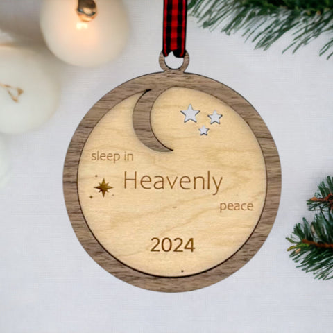 Slumber in serenity with our Sleep in Heavenly Peace Wooden Ornament. Crafted with care, this ornament brings the tranquility of a peaceful night's sleep to your holiday decor. Embrace the warmth and comfort of the season with this timeless addition to your tree