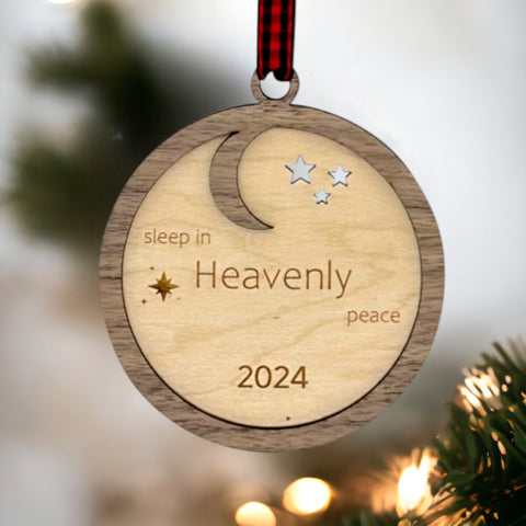 Slumber in serenity with our Sleep in Heavenly Peace Wooden Ornament. Crafted with care, this ornament brings the tranquility of a peaceful night's sleep to your holiday decor. Embrace the warmth and comfort of the season with this timeless addition to your tree