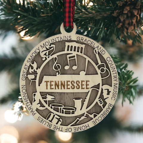 Celebrate the Volunteer State with our Tennessee State Highlights Ornament! A miniature masterpiece capturing the heart and soul of Tennessee's charm. Elevate your holiday decor with a touch of southern warmth. 