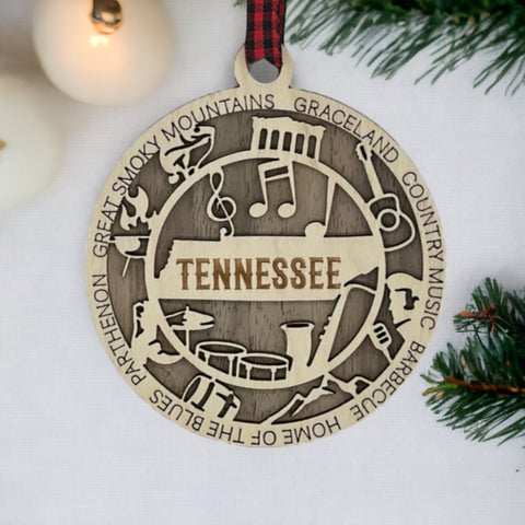 Celebrate the Volunteer State with our Tennessee State Highlights Ornament! A miniature masterpiece capturing the heart and soul of Tennessee's charm. Elevate your holiday decor with a touch of southern warmth.