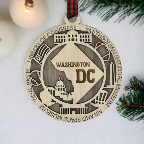 Capture the essence of the nation's capital! Presenting the Washington, DC Highlights Ornament—a miniature masterpiece celebrating iconic landmarks and history. Elevate your holiday decor with a touch of political charm. Commemorate the heart of the nation this festive season!