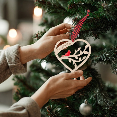 In honor of a cherished soul, this wooden ornament symbolizes the enduring strength and natural beauty of the memories we hold dear. Crafted with love, it carries the essence of the one we remember with fondness during this festive season. Just as the wood whispers tales of resilience, may this ornament echo the everlasting love that transcends time.