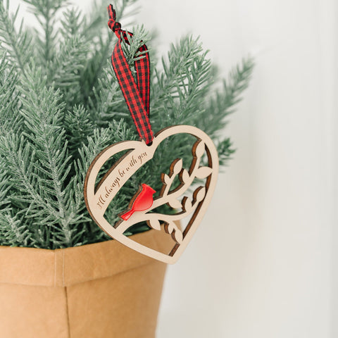 In honor of a cherished soul, this wooden ornament symbolizes the enduring strength and natural beauty of the memories we hold dear. Crafted with love, it carries the essence of the one we remember with fondness during this festive season. Just as the wood whispers tales of resilience, may this ornament echo the everlasting love that transcends time.