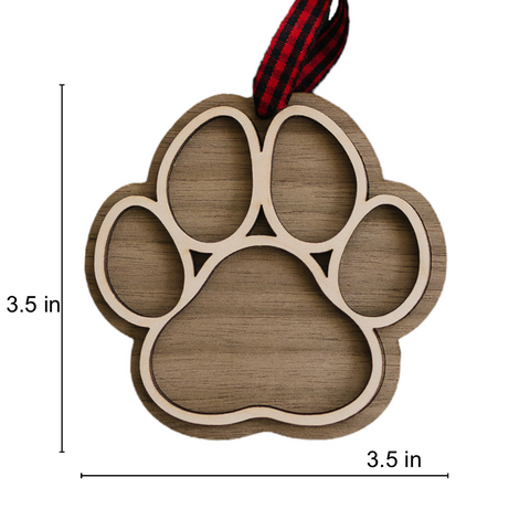 Adorable Personalized Dog Paw Ornament - Cherish your furry friend with this customized ornament featuring a cute paw print. Add your dog's name for a truly special keepsake, perfect for celebrating the joy your pet brings to your holiday season.