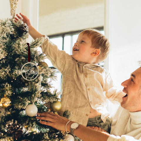 Elegant ASL (American Sign Language) 'I Love You' ornament, a beautiful symbol of love and inclusivity. Celebrate the spirit of connection and communication with this heartfelt decoration, perfect for the holiday season and beyond.