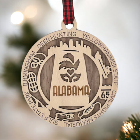 An intricately crafted Alabama State Highlights Ornament featuring iconic landmarks and symbols, showcasing the rich heritage and vibrant culture of the Heart of Dixie.