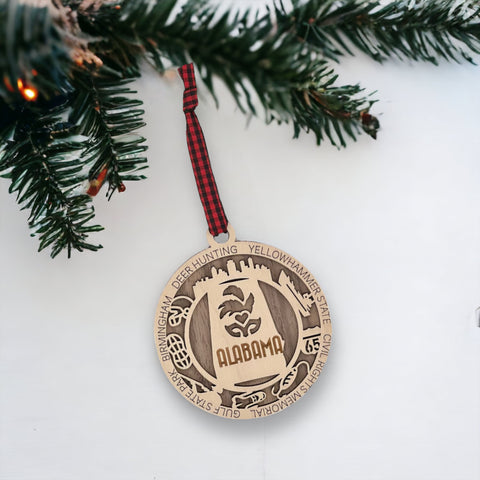 An intricately crafted Alabama State Highlights Ornament featuring iconic landmarks and symbols, showcasing the rich heritage and vibrant culture of the Heart of Dixie.