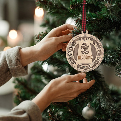 An intricately crafted Alabama State Highlights Ornament featuring iconic landmarks and symbols, showcasing the rich heritage and vibrant culture of the Heart of Dixie.